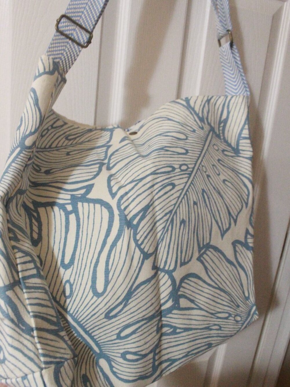 Title: Blue & Cream Tropical Leaf Shoulder Bag with Ocean Print Lining